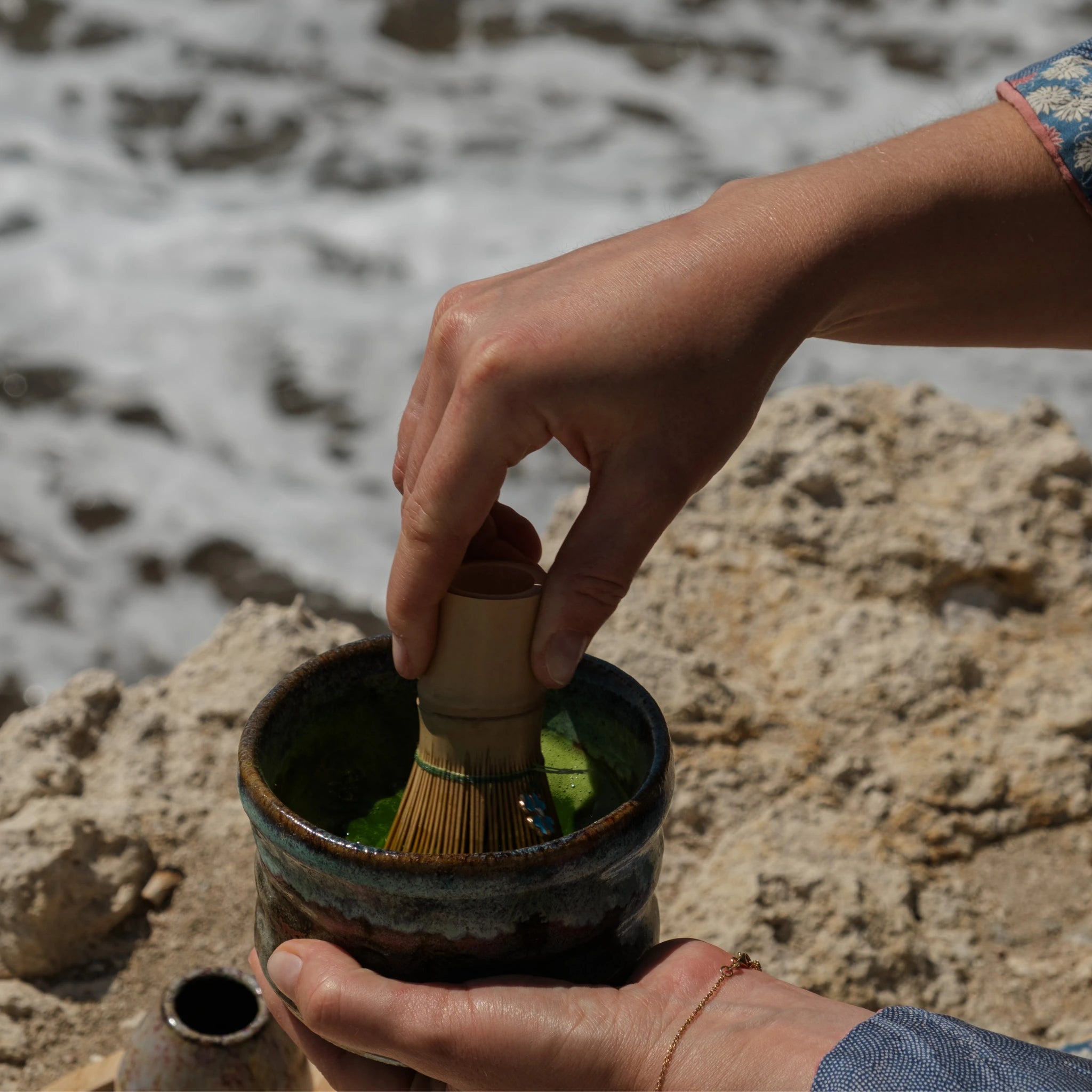 Whisking matcha with bamboo chasen – Japanese tea ritual by the sea - ESTRADORA