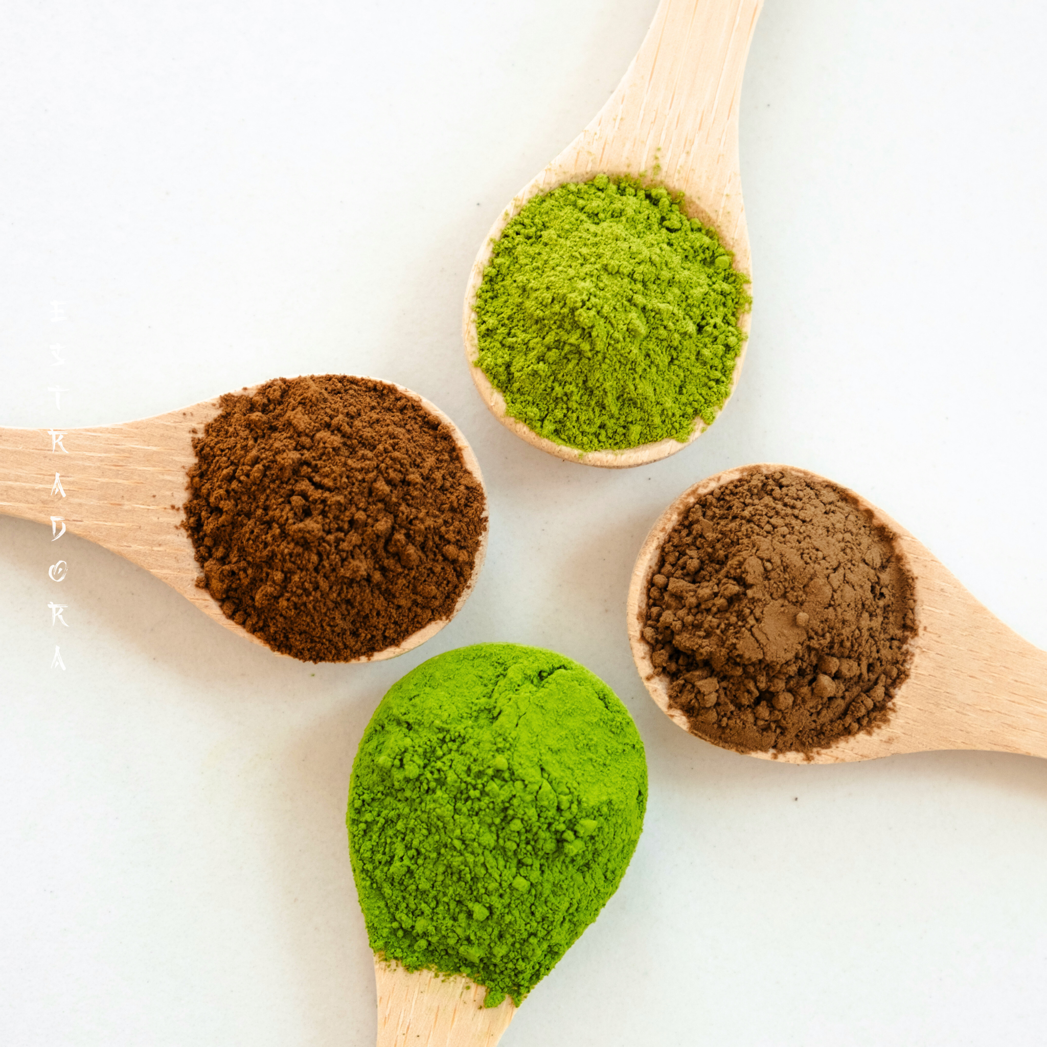 Japanese powdered teas assortment – matcha, hojicha, wakoucha, genmaicha – wooden spoons. Cyprus & worldwide delivery.