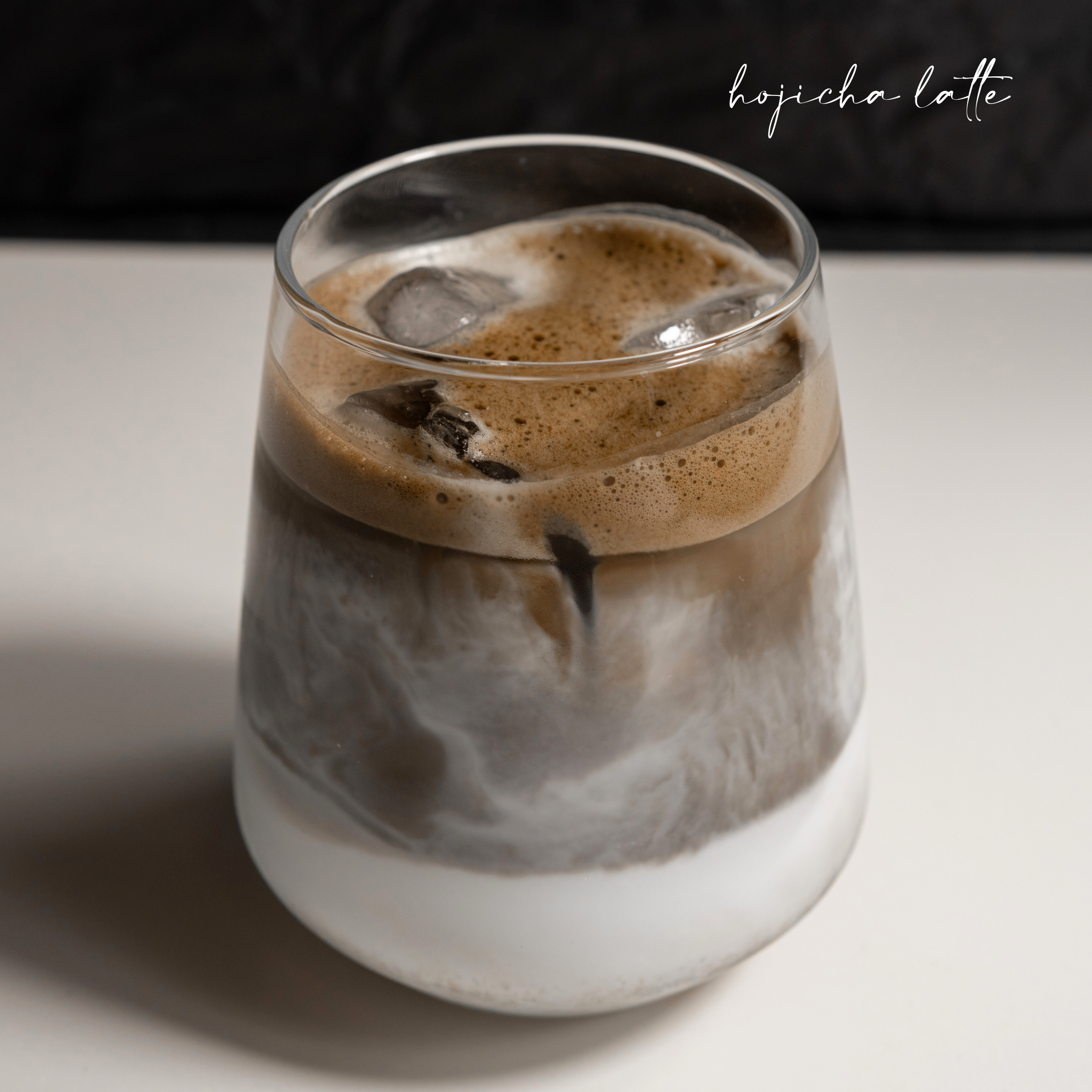 Freshly whisked Japanese Hojicha tea with milk — Estradora roasted green tea powder
